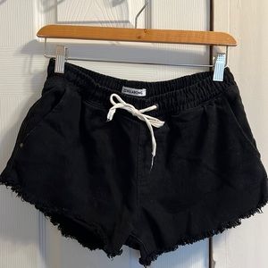 Black denim shorts